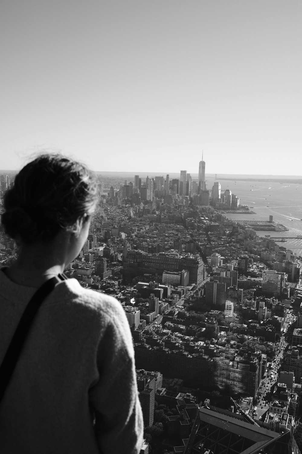 a man looking out over a city