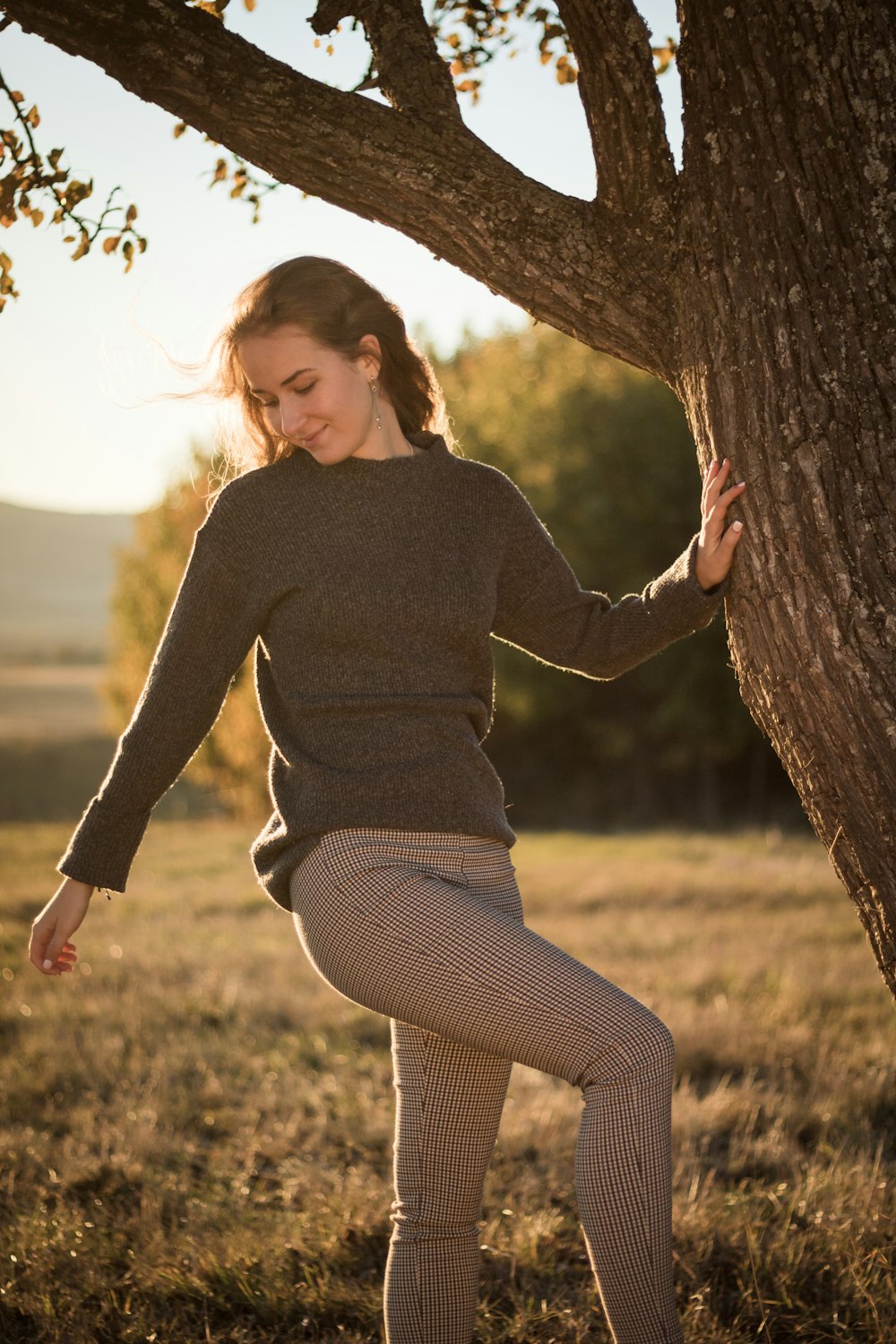 a person standing in a tree