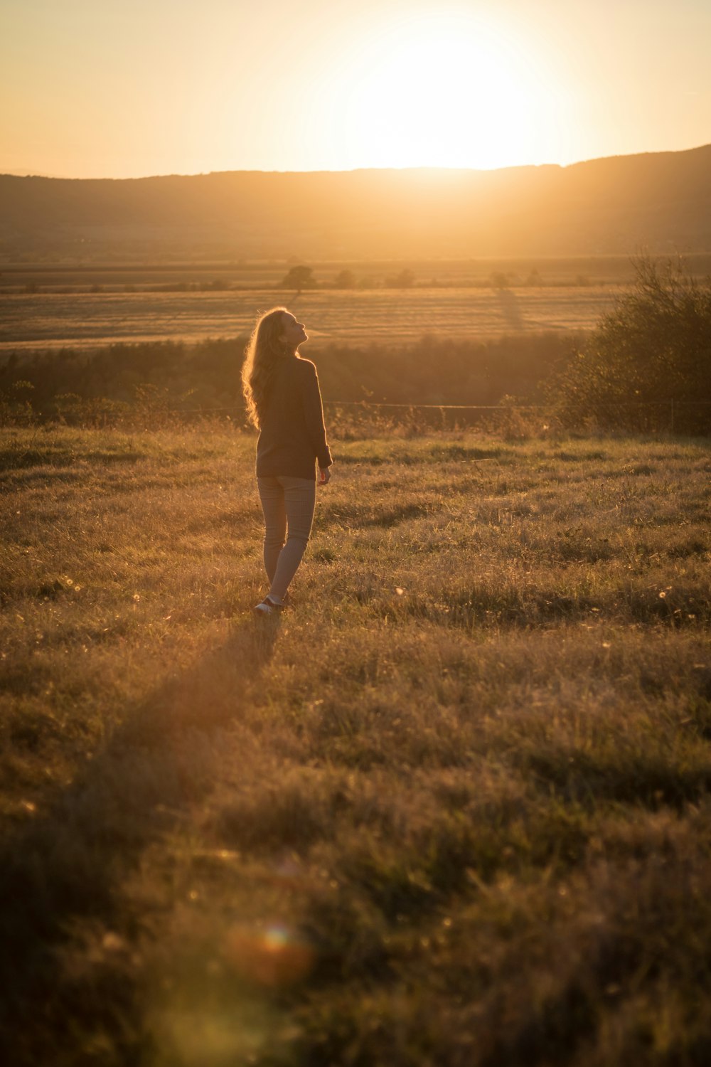 a man standing in a field