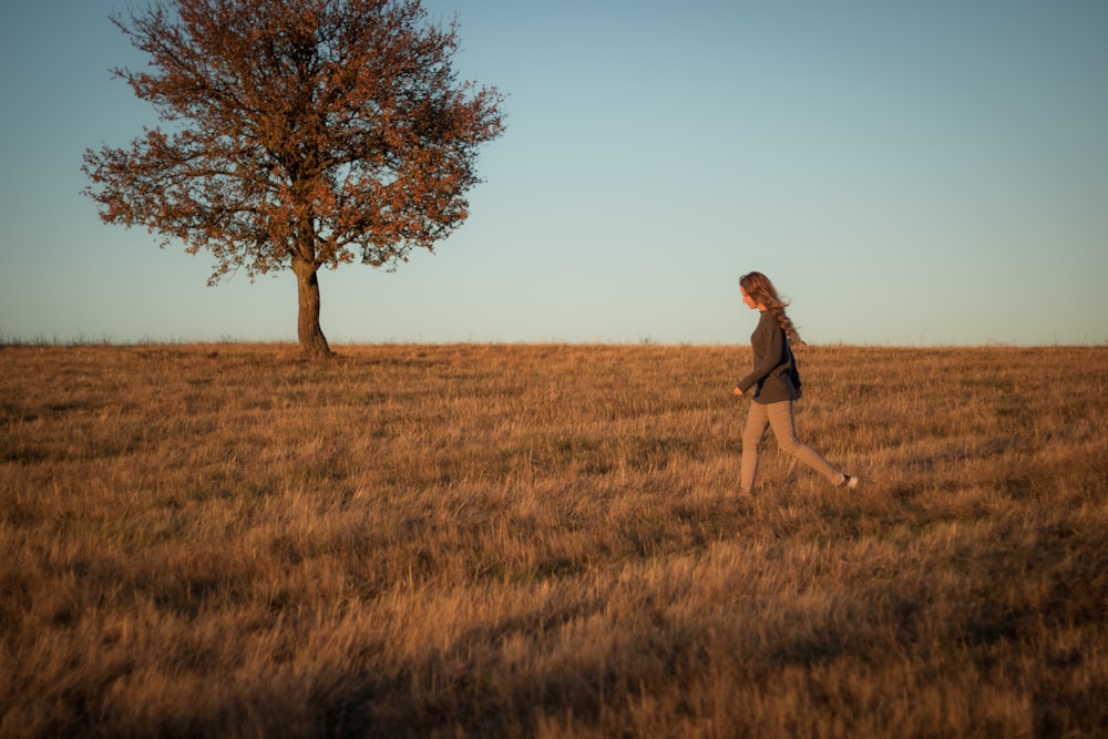 a person running in a field