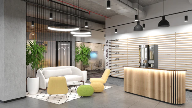 a room with a couch and chairs