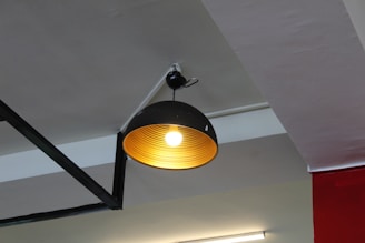 a light fixture from a ceiling