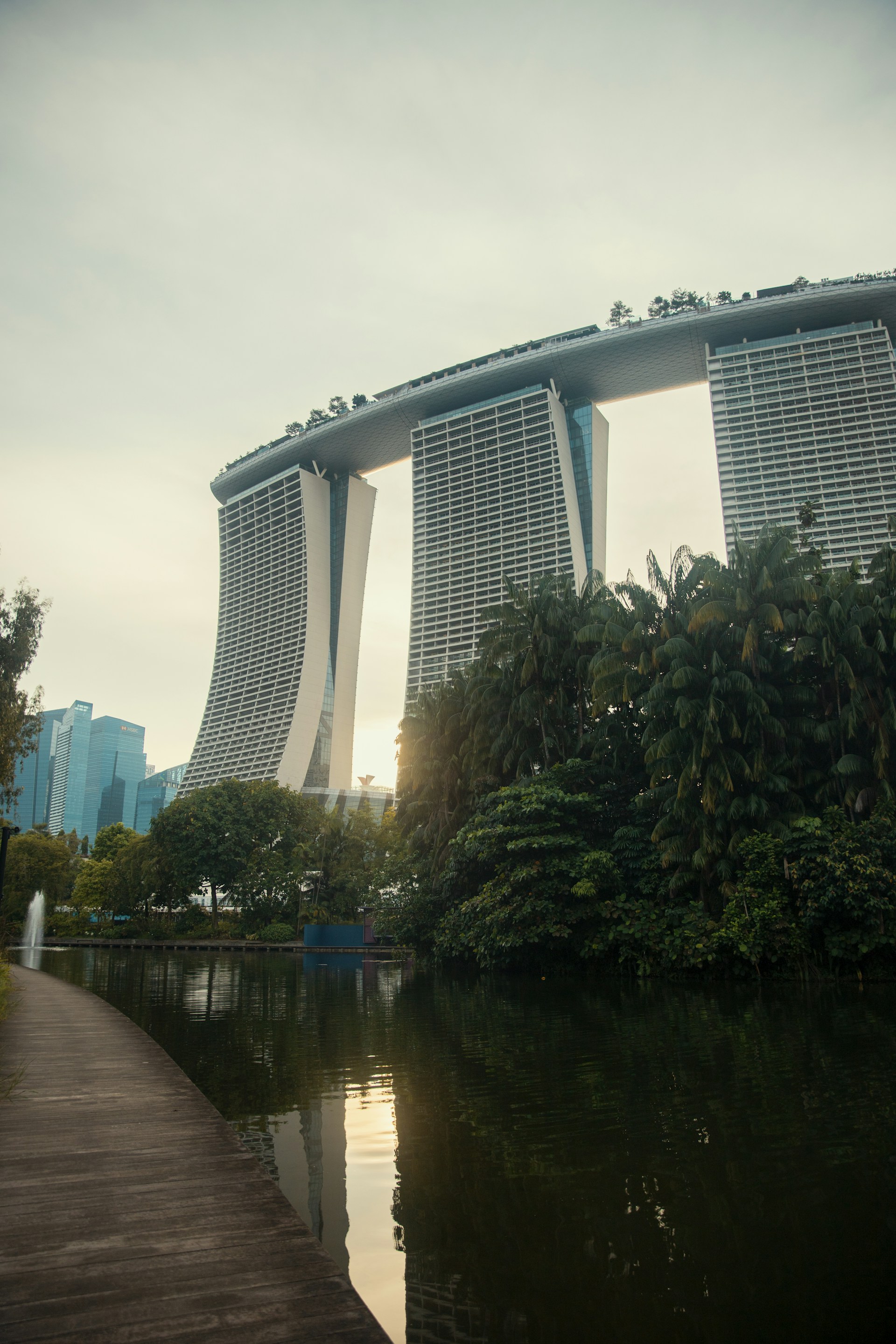woman wearing yellow long-sleeved dress under white clouds and blue sky during daytime