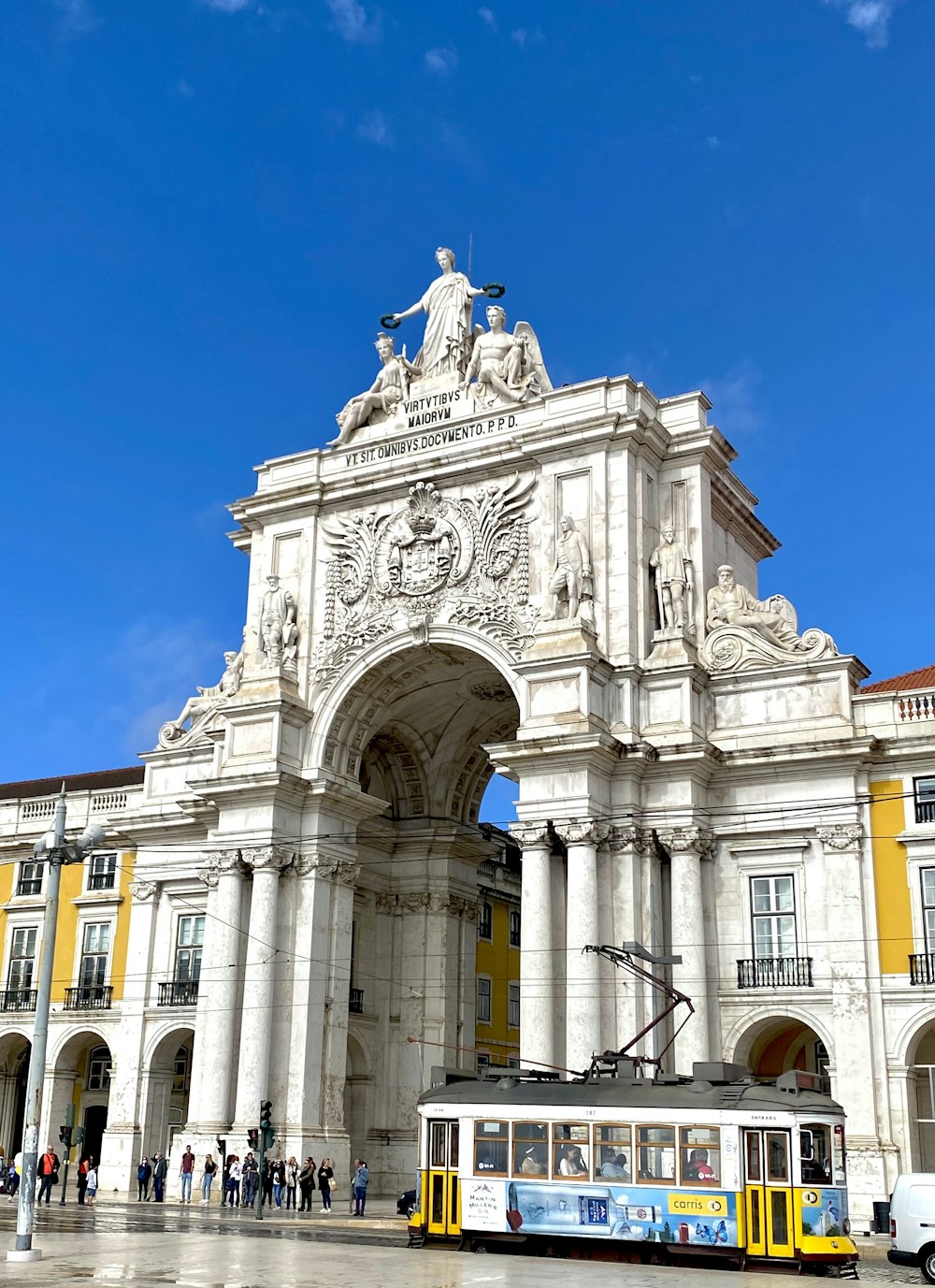 a large building with a statue on top of it