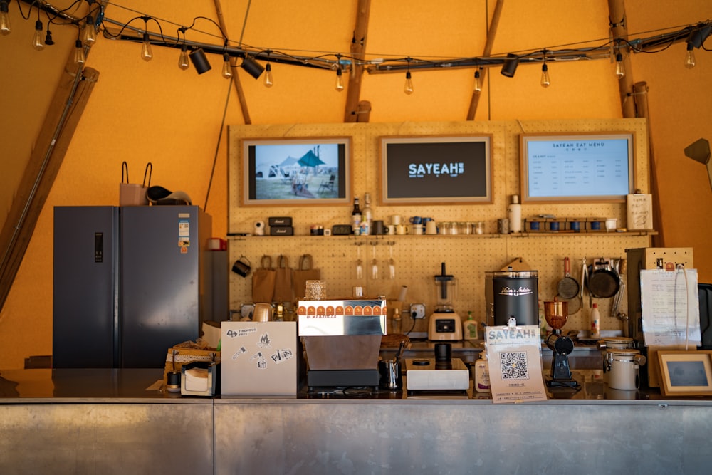 a kitchen with a large display