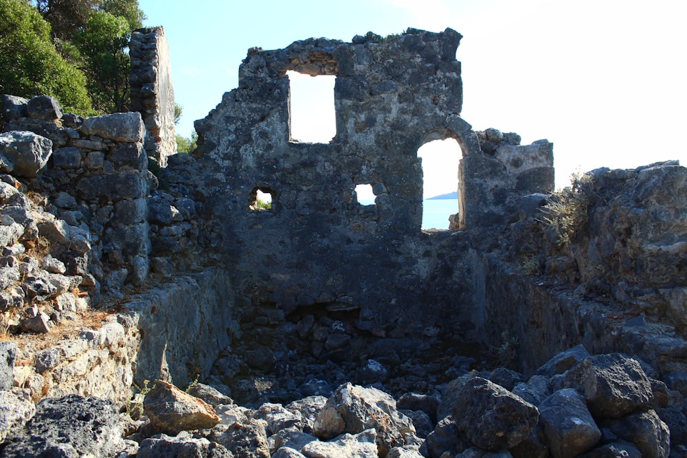 a stone structure with windows