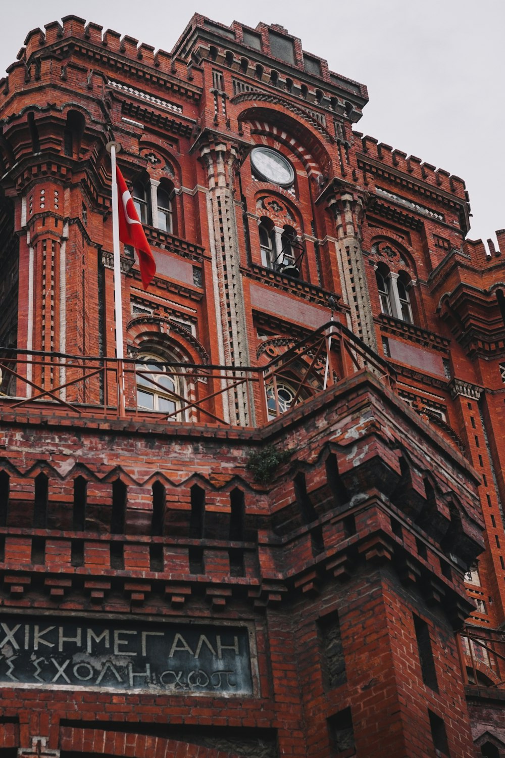 a clock on a brick building