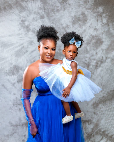 a person holding a baby