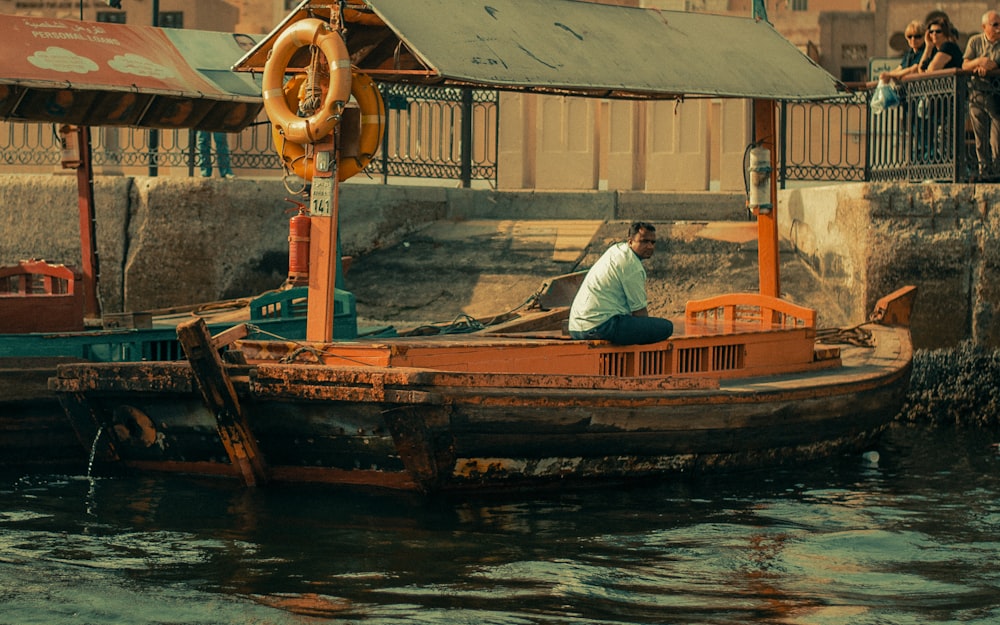 a person sitting on a boat