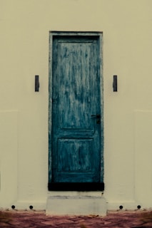 a blue door on a wall