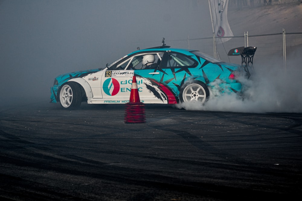 a race car with smoke coming out of it