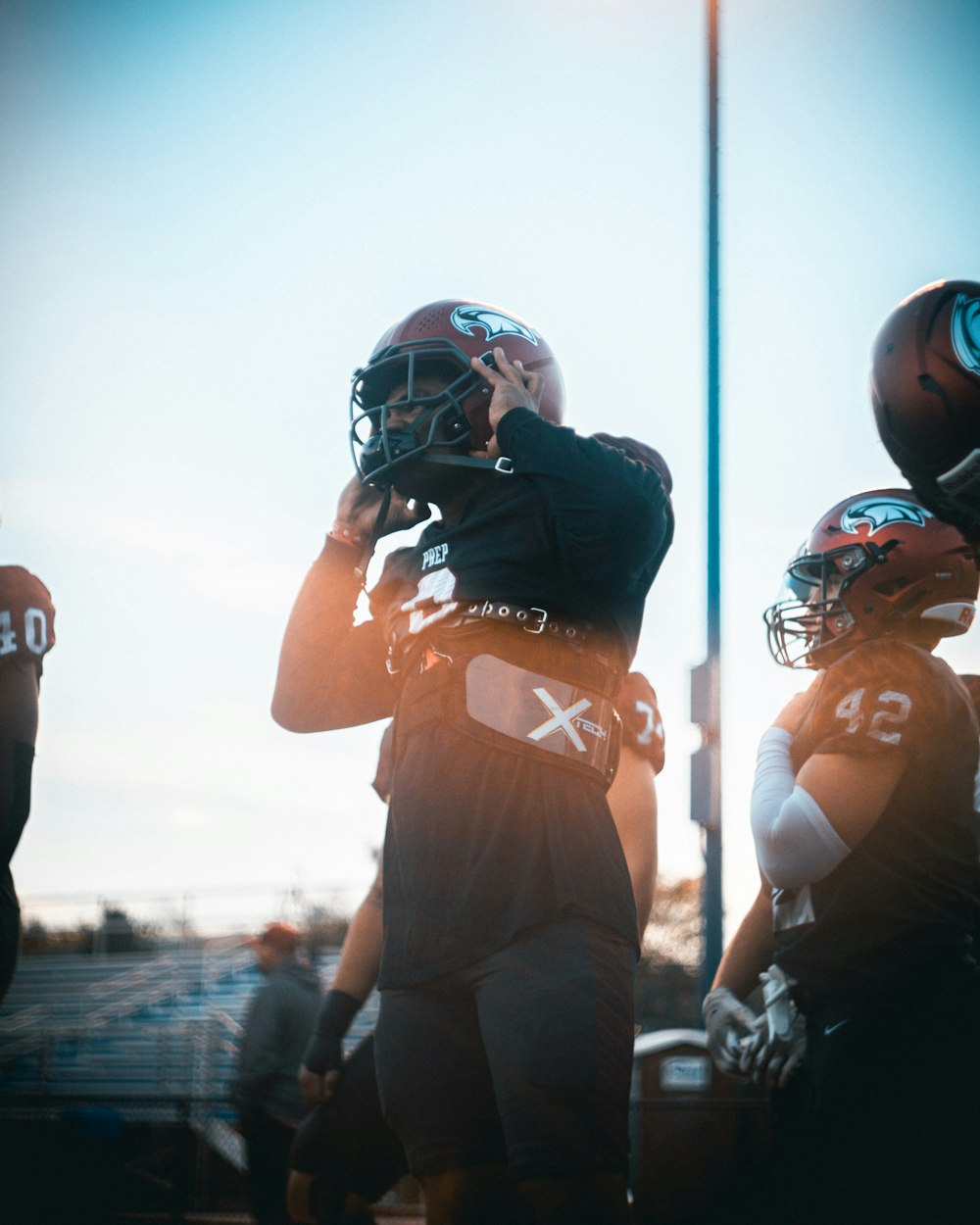 a football player holding a football