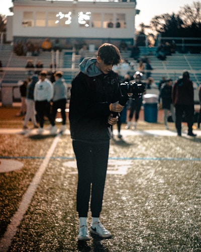 a person holding a camera