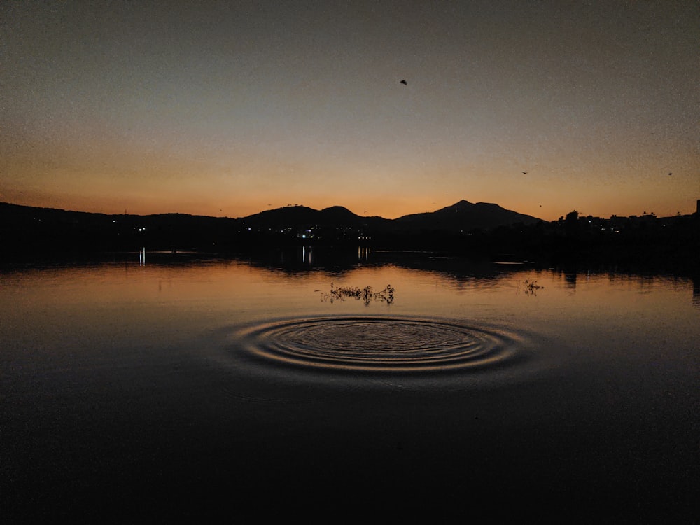 a large body of water with a circle in the middle