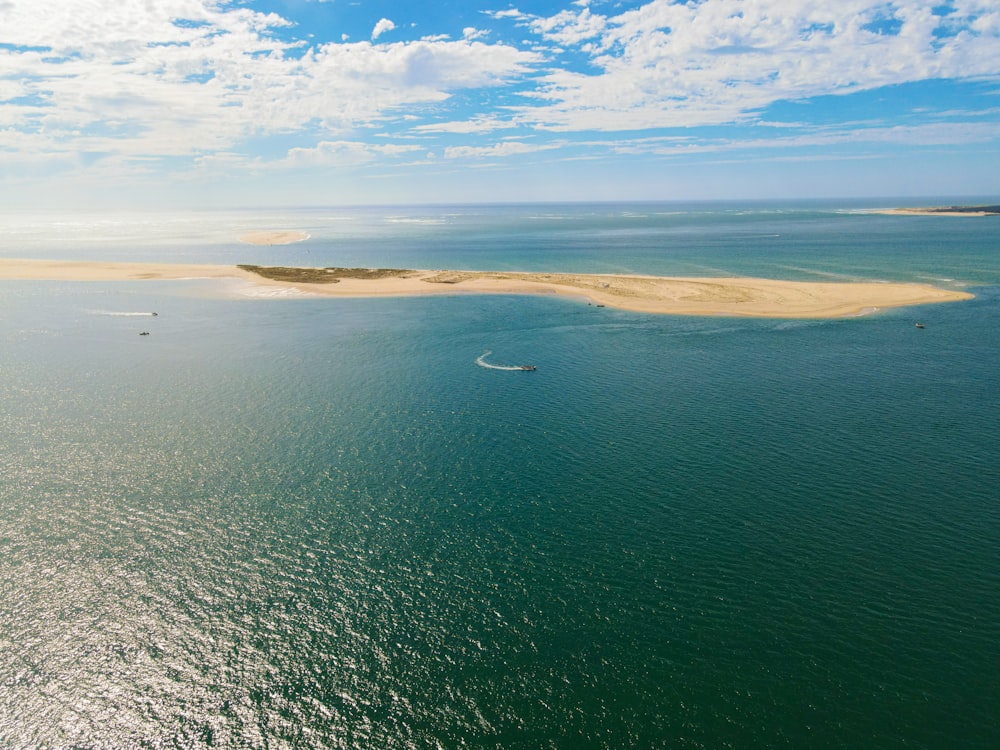 a body of water with land in the distance