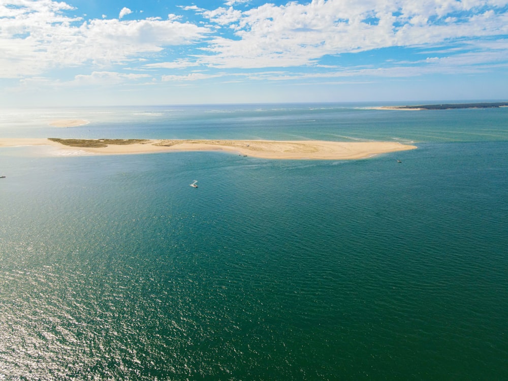 a body of water with land in the distance