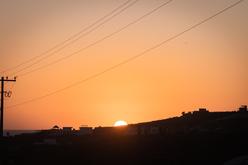 a sunset over a city