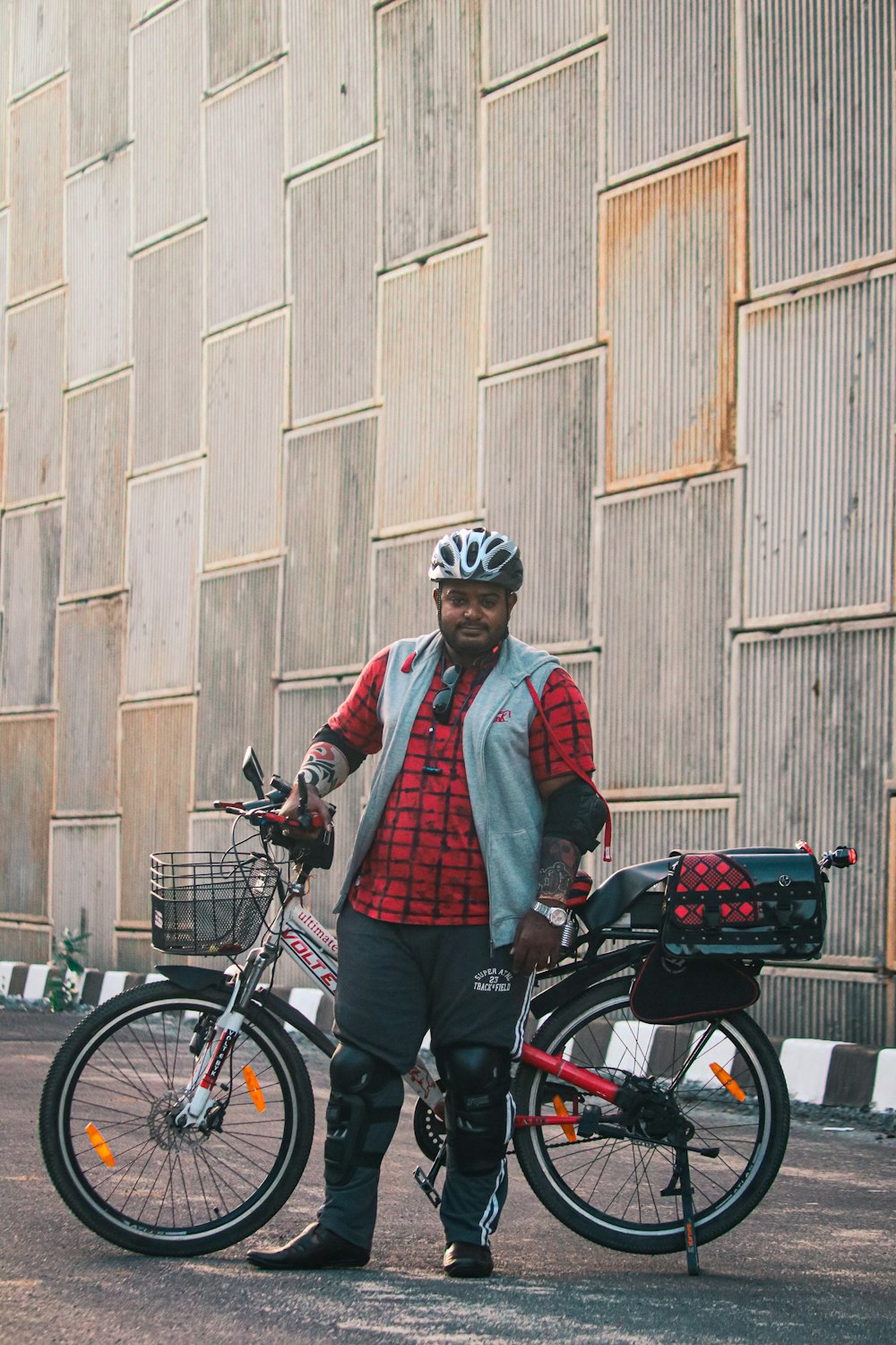 a person standing next to a bicycle