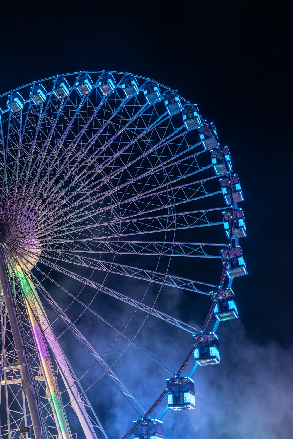 a ferris wheel at night