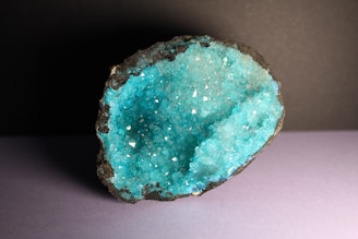 a blue rock with white spots