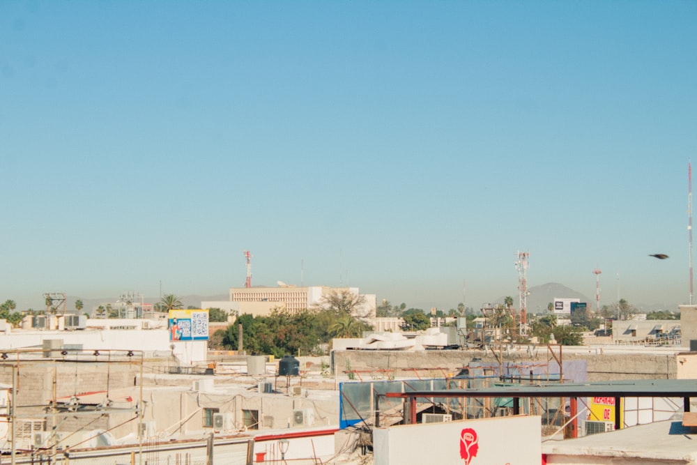 a city with buildings and a blue sky