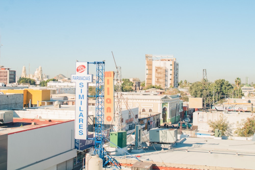 a city with buildings and a sign