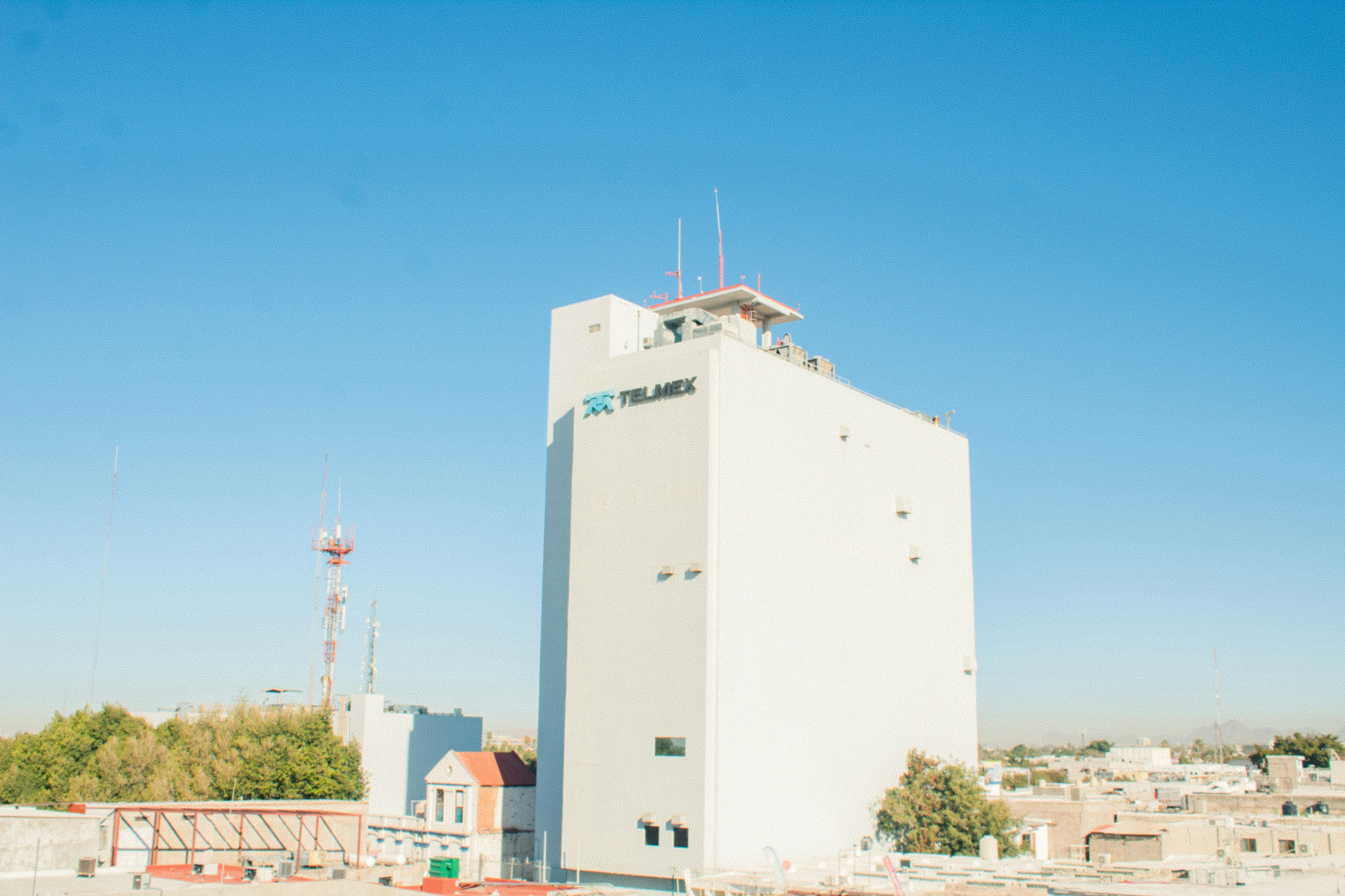 a white building with a blue sky