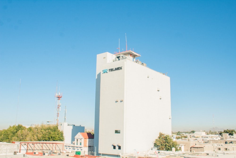 a white building with a blue sky