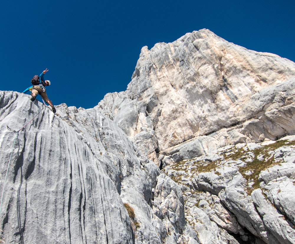 a person climbing a mountain