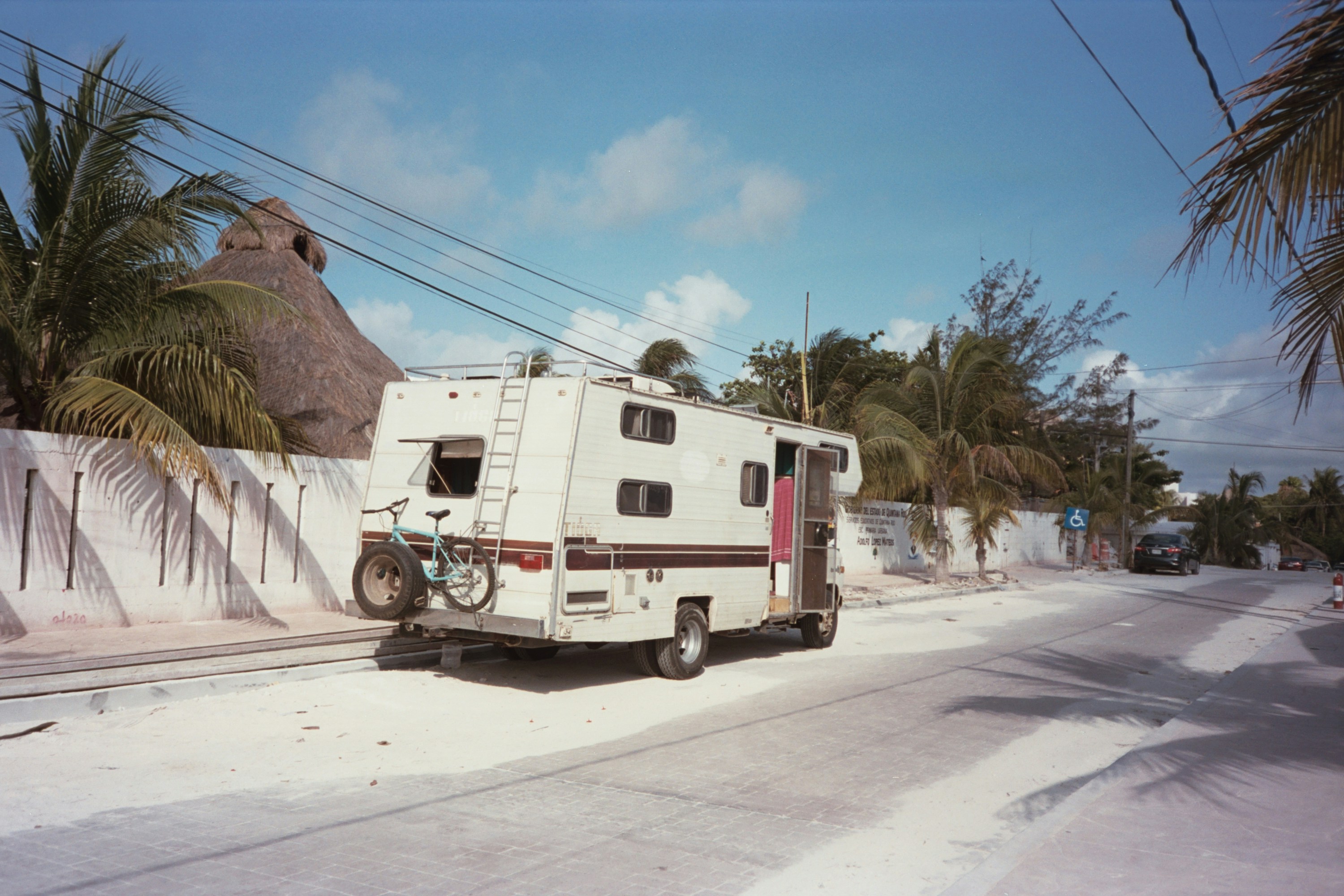 a white rv on a street