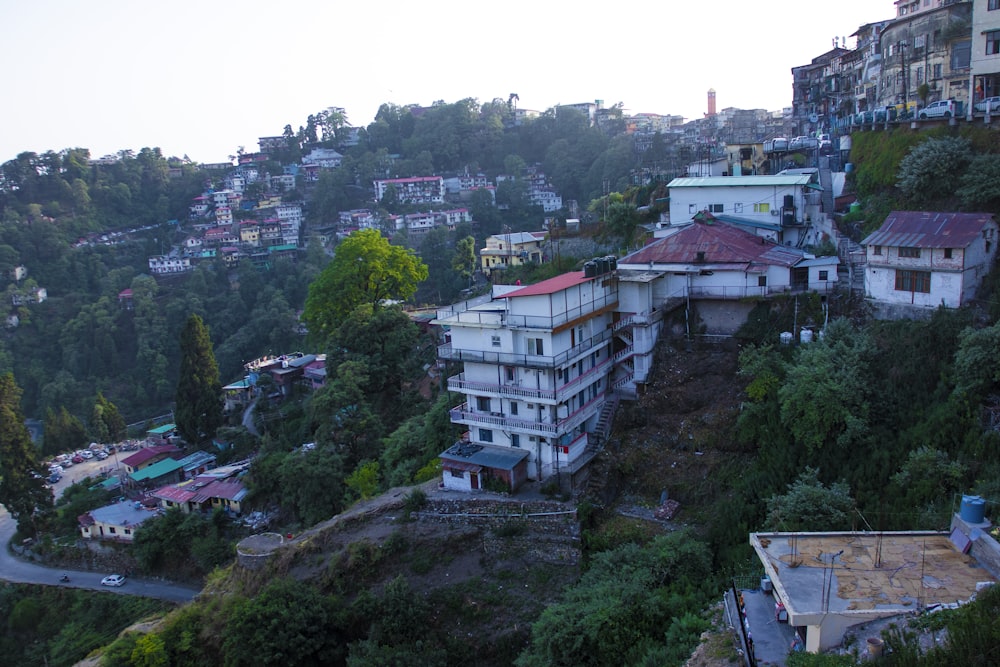 a group of buildings surrounded by trees