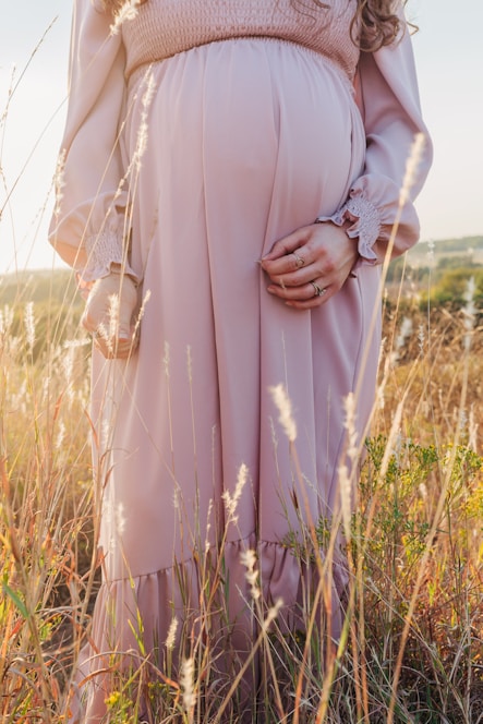a person wearing a pink dress