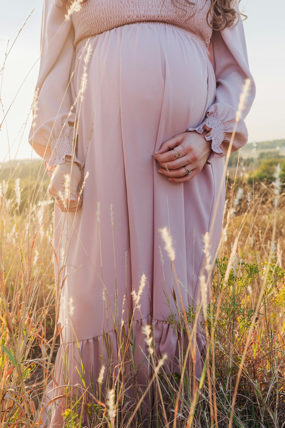 a person wearing a pink dress