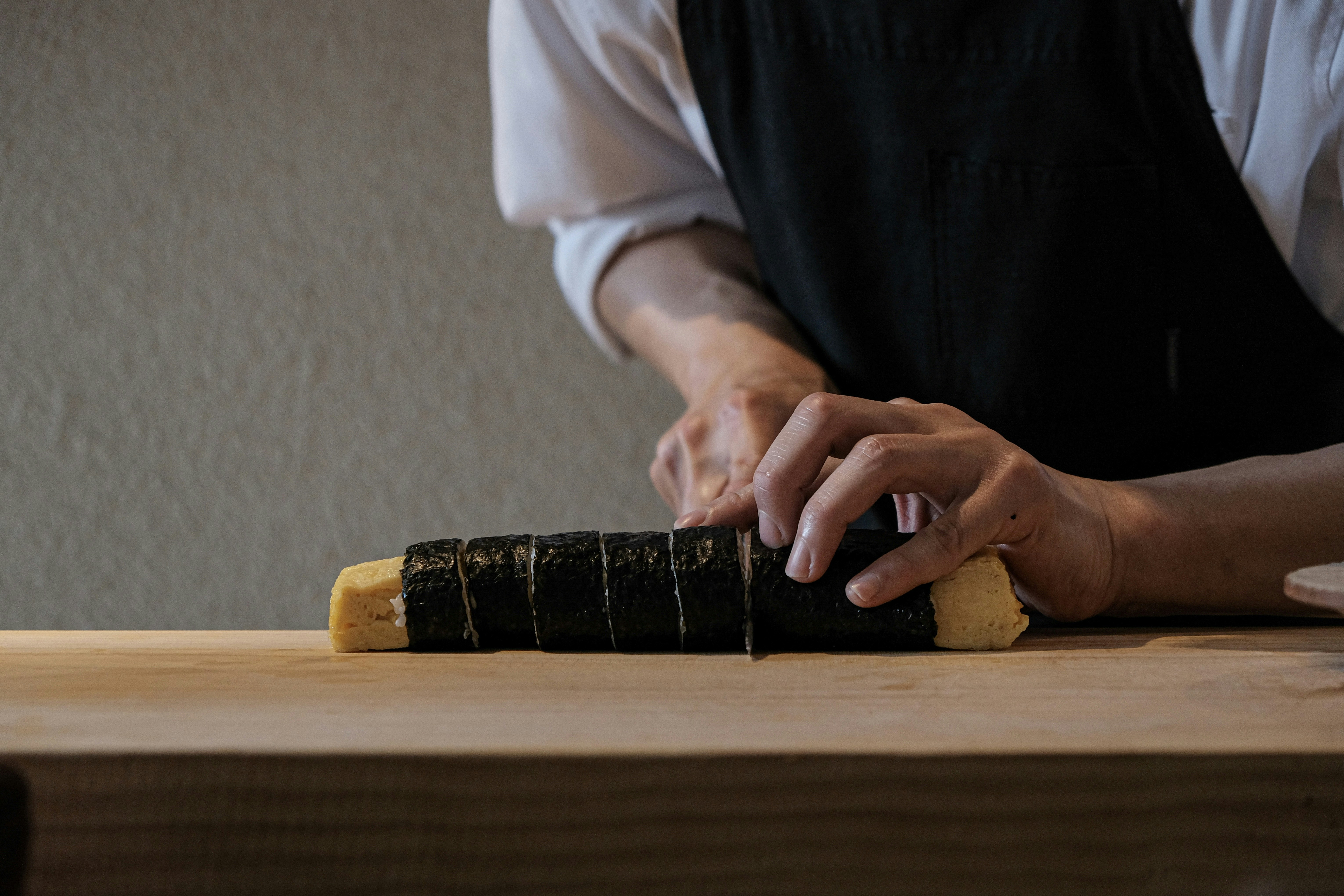 a person holding a wooden board