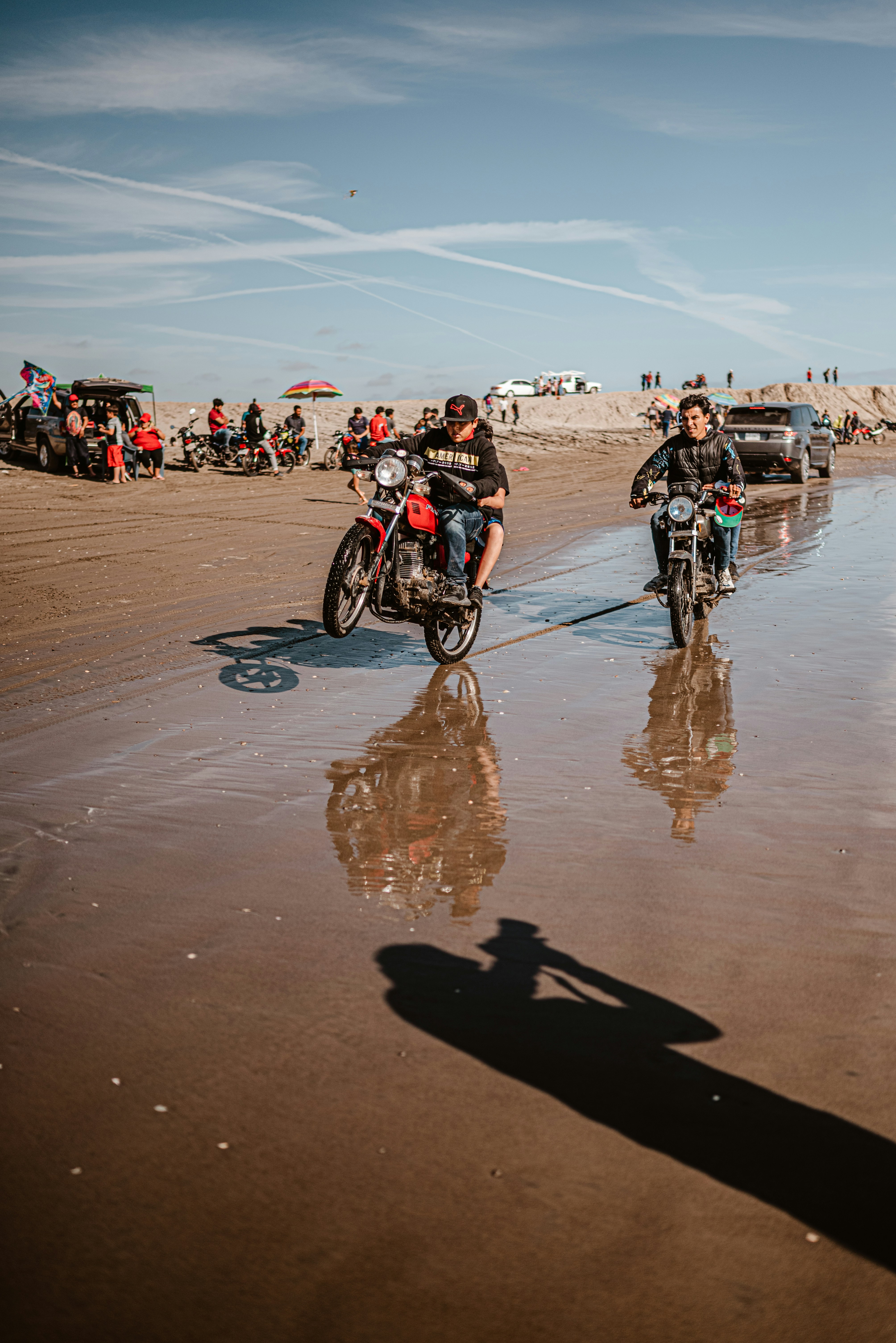 A group of people riding motorcycles on a beach photo – Free Mexico ...