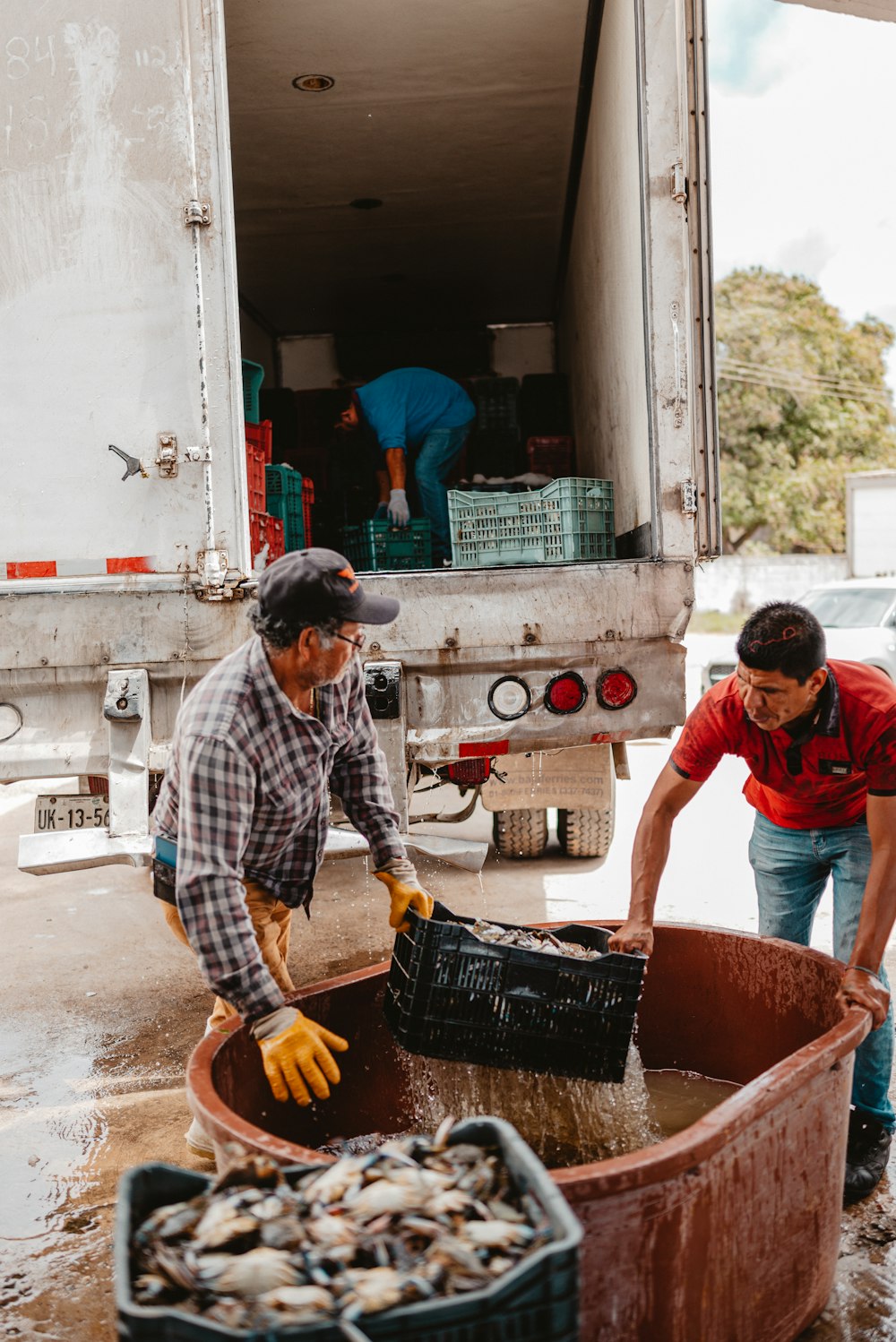 men working in a truck