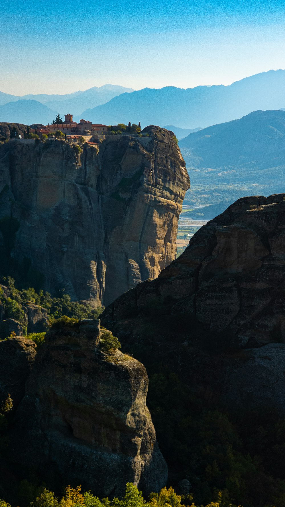 a cliff with a building on it