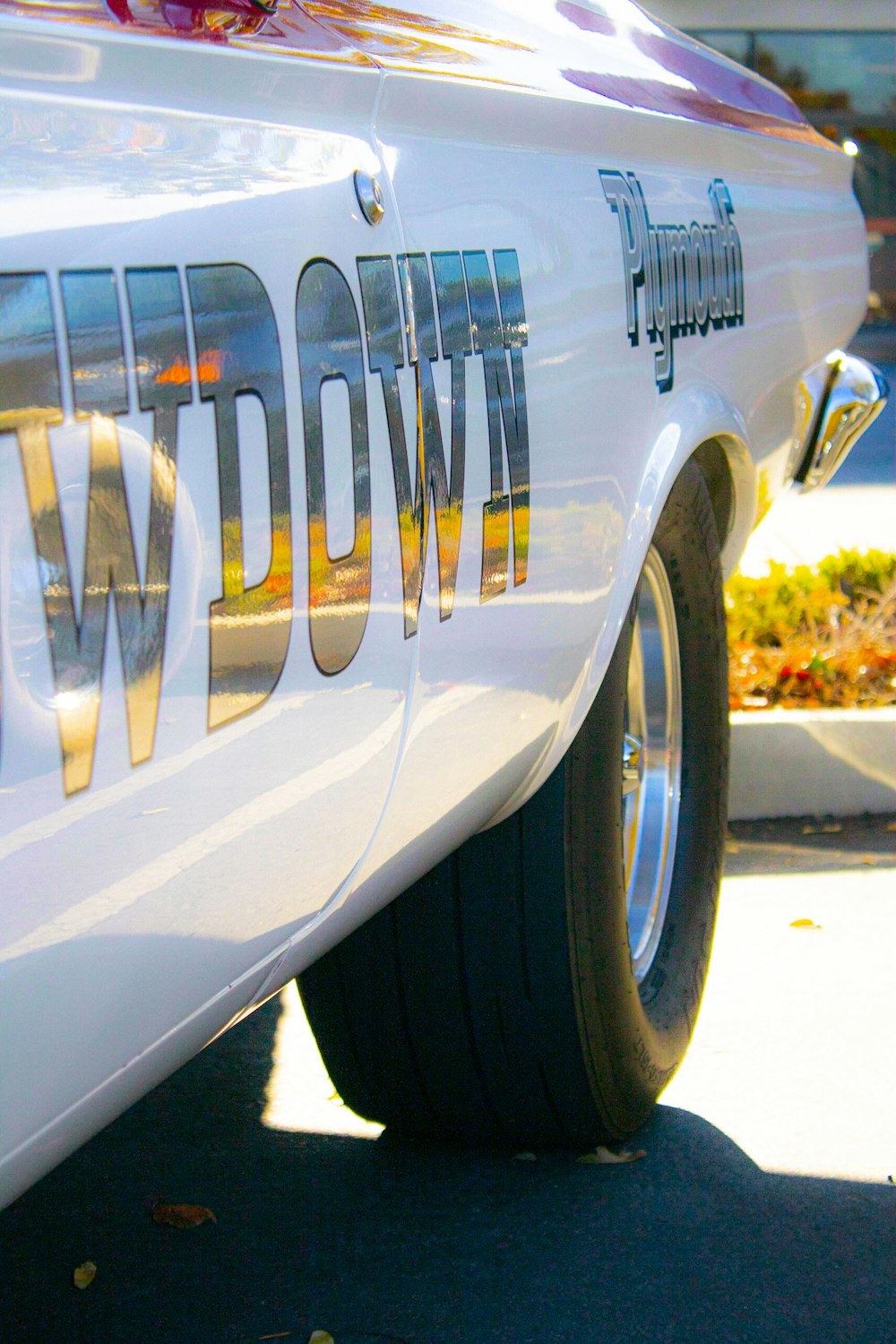 a white car with black rims