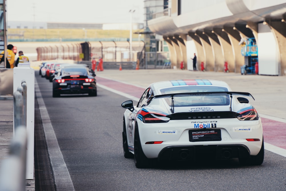 a group of race cars on a track