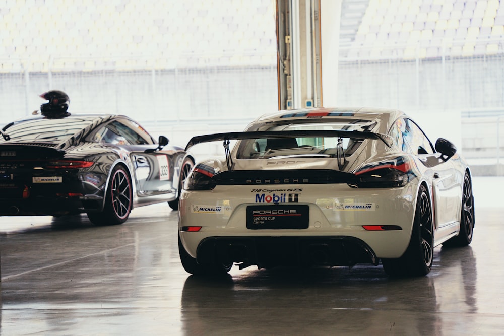 a group of cars parked in a garage