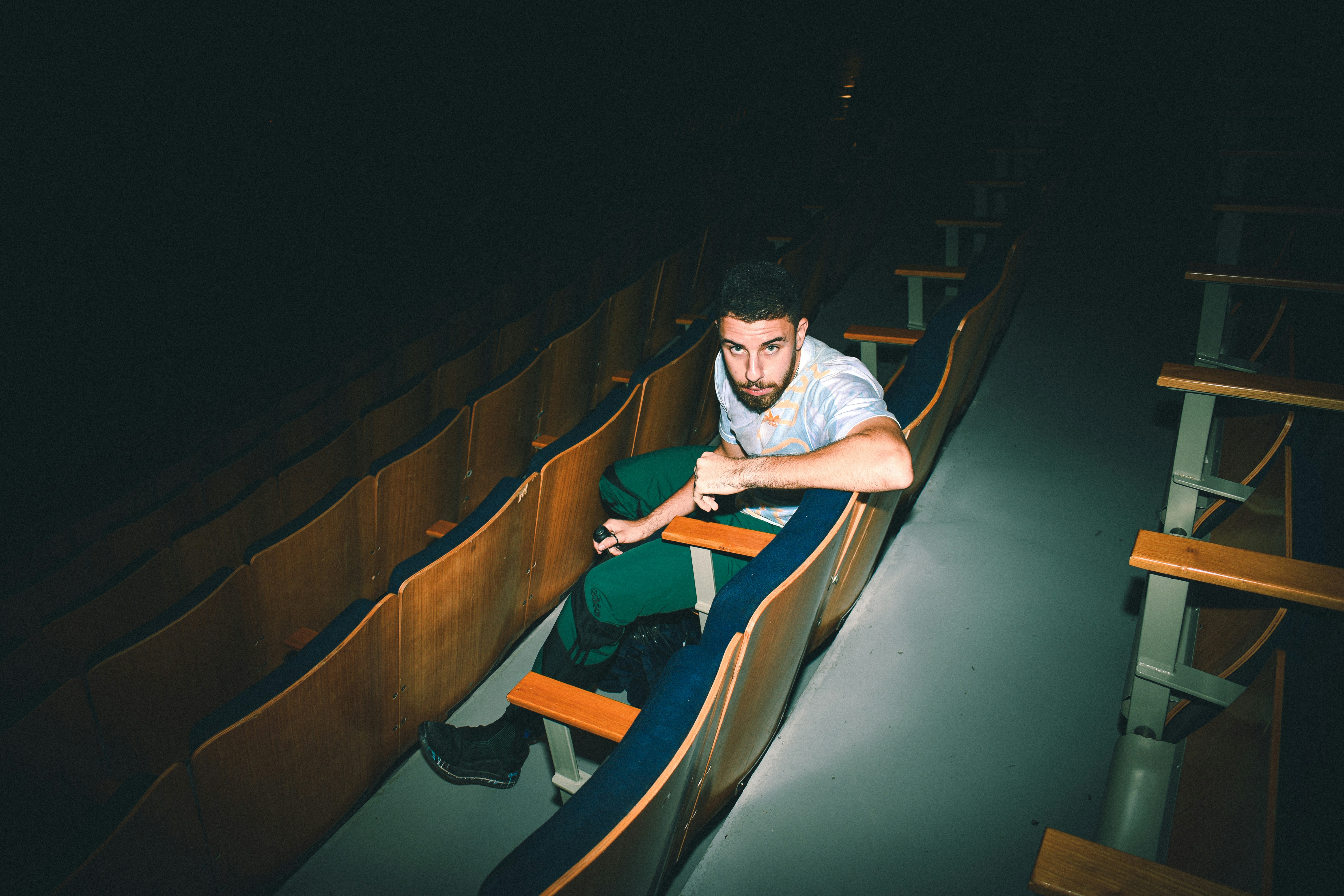 A man sitting on a slide