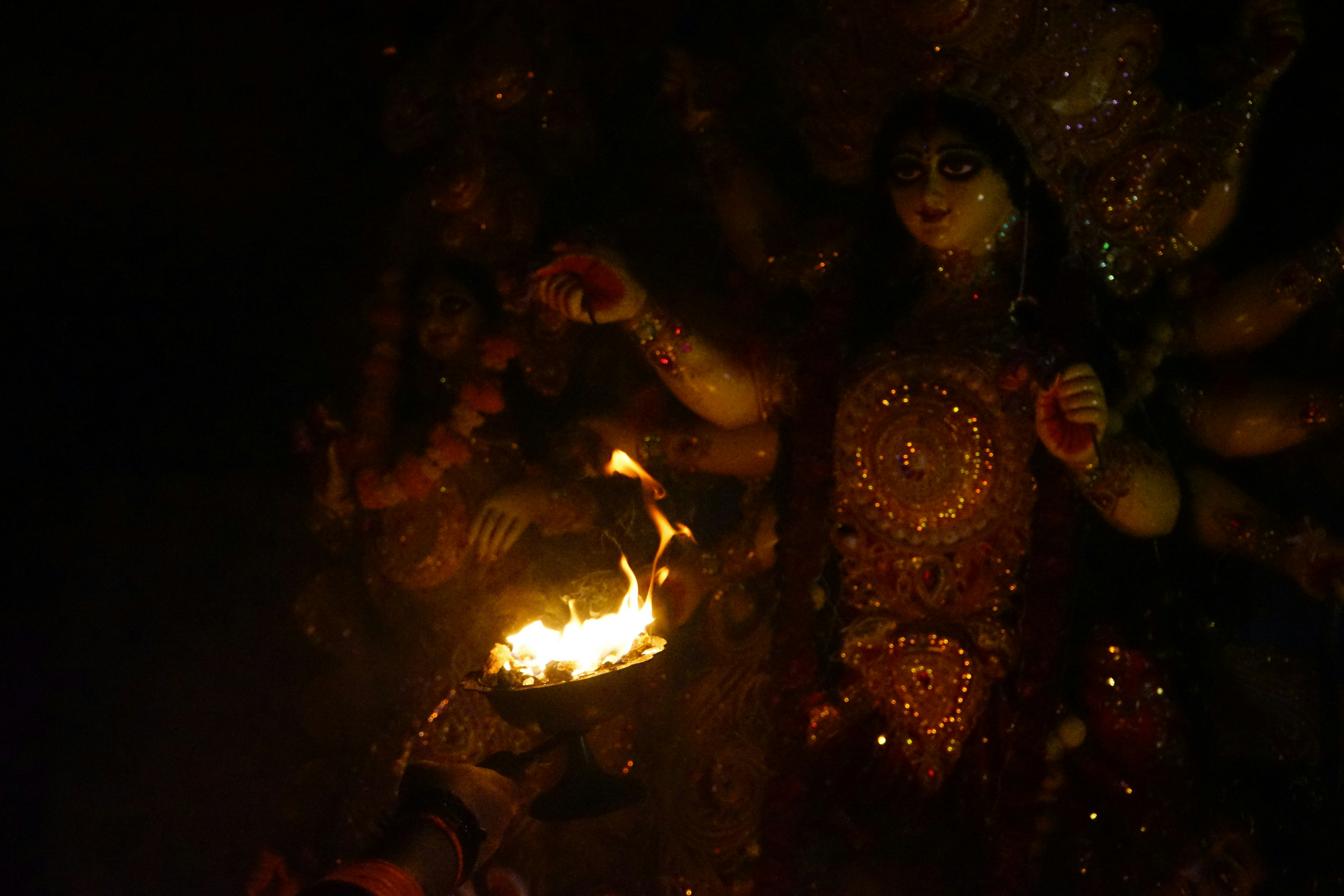 A person holding a light saber