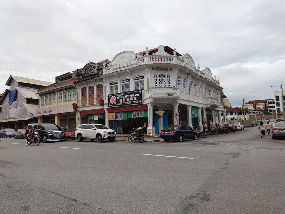 a street with cars and people on it