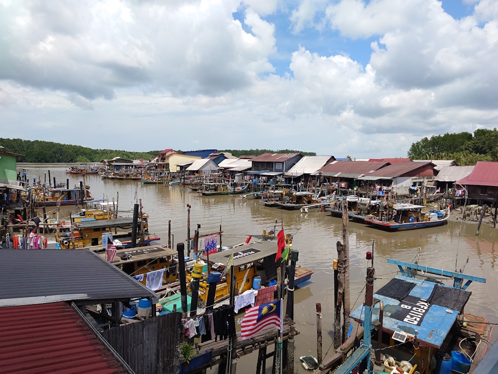 a body of water with boats and buildings along it