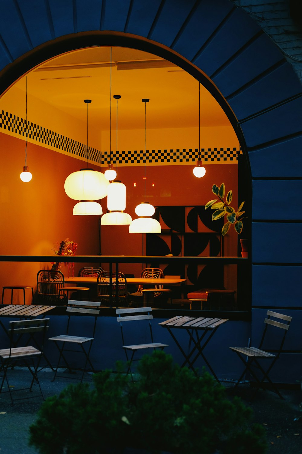 a restaurant with tables and chairs