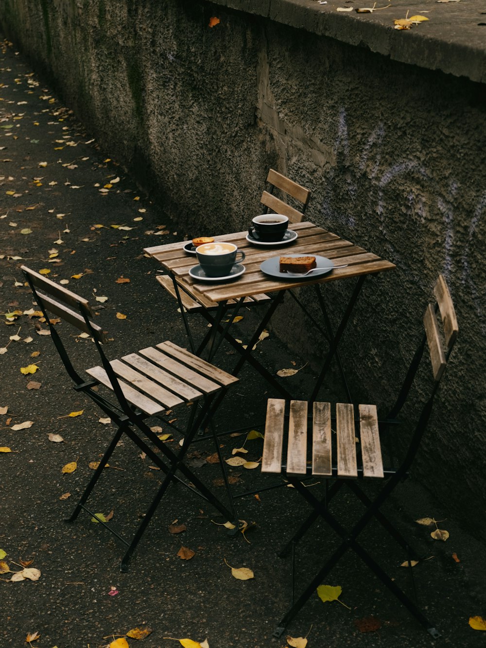 a table with plates and bowls on it