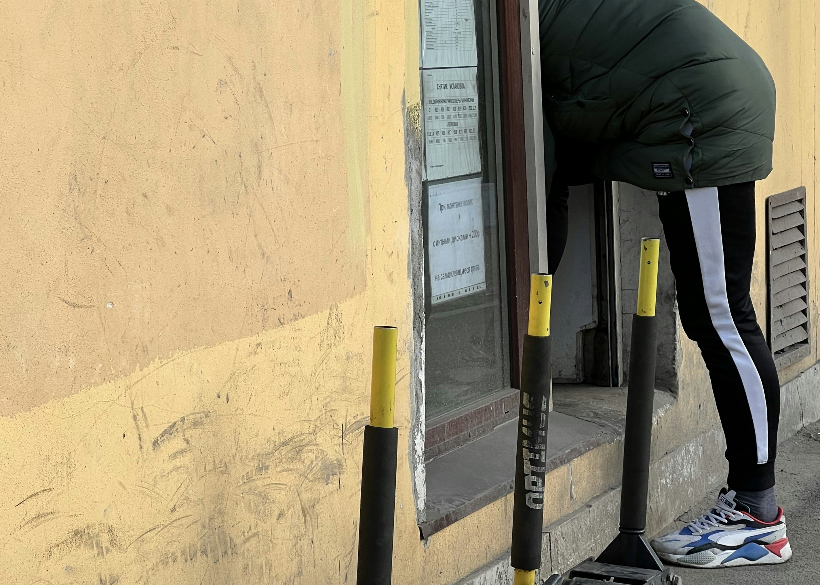 a person standing next to a door