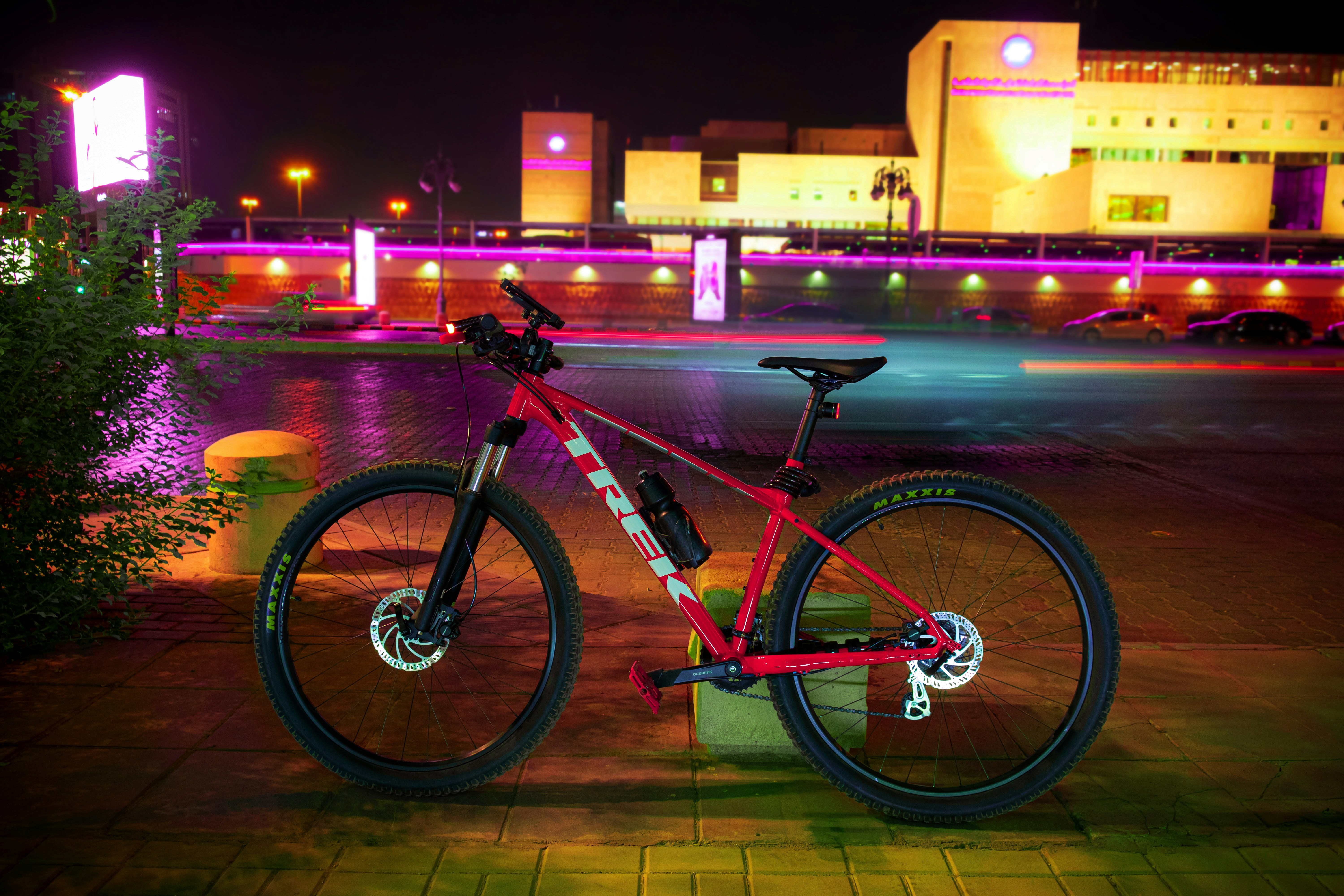 a bicycle parked on a sidewalk
