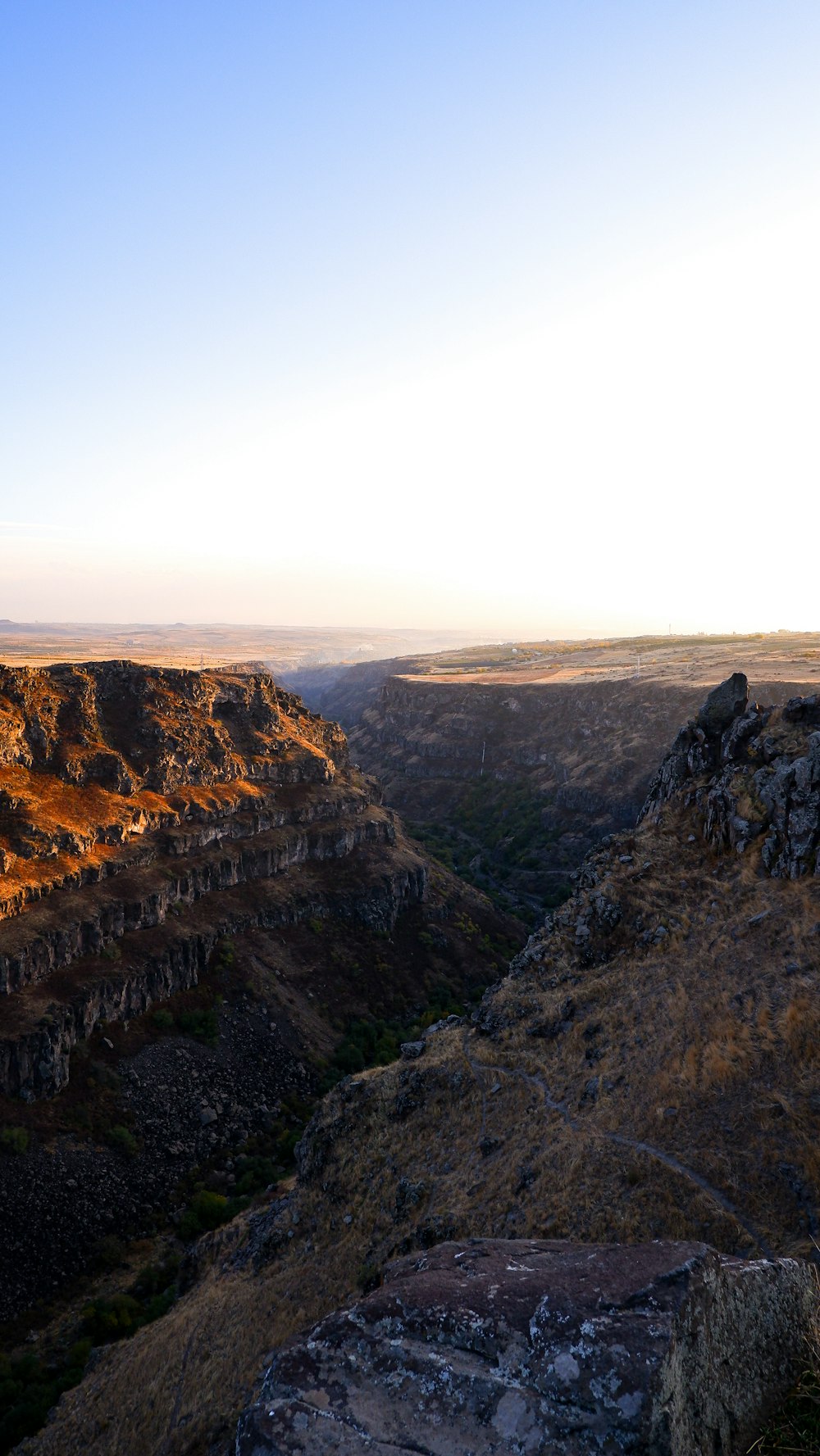 a canyon with a river running through it