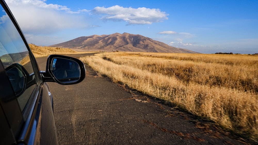 a car driving on a dirt road